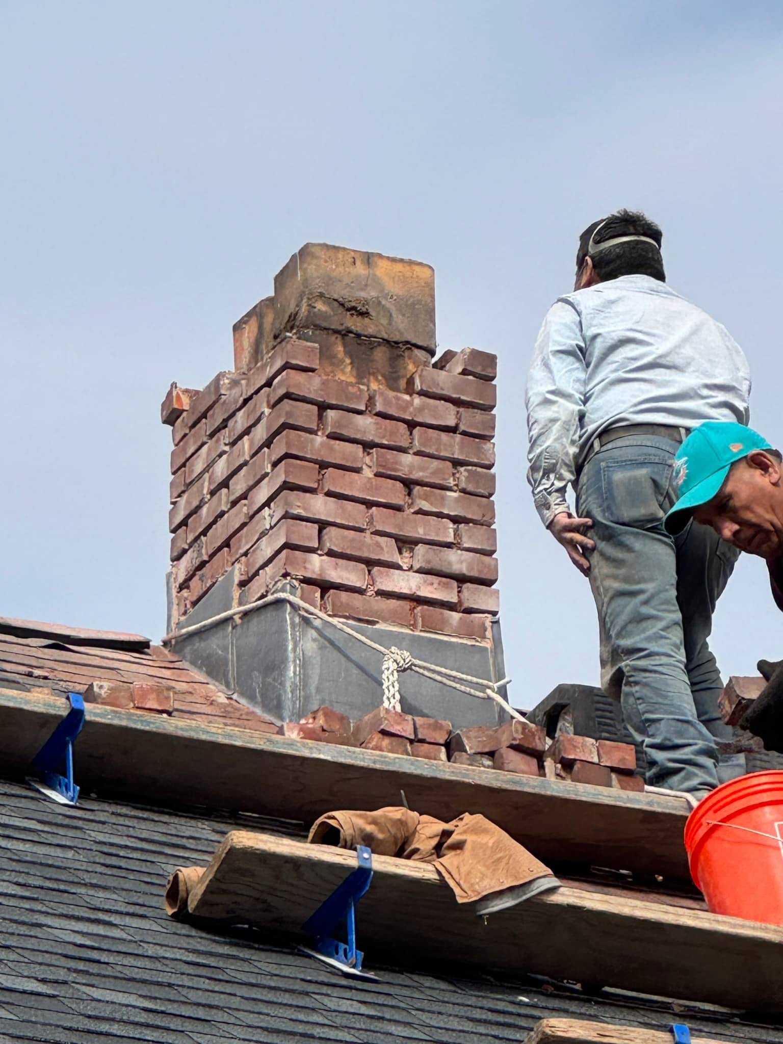 Chimney repointing with fresh mortar joints built for New England freeze-thaw cycles
