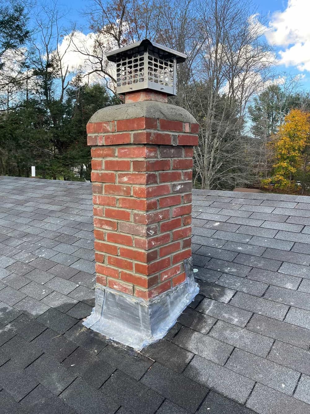 Central Connecticut chimney restoration by J Corrigan LLC, fresh mortar, repointed joints, new cap