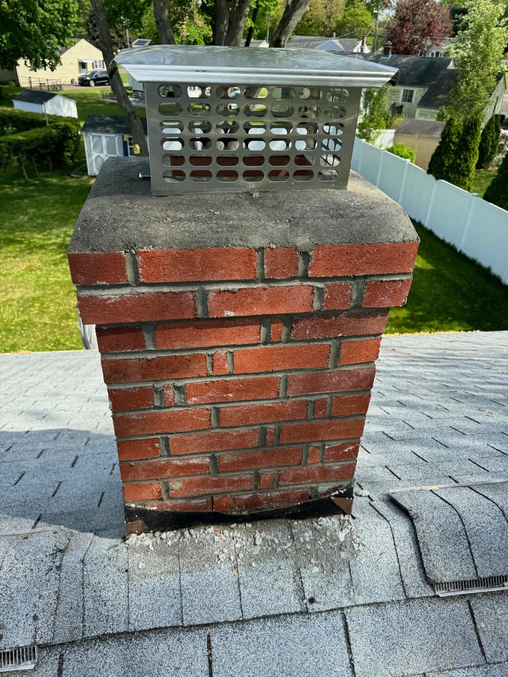 Chimney rebuild with new brick matched to the existing masonry